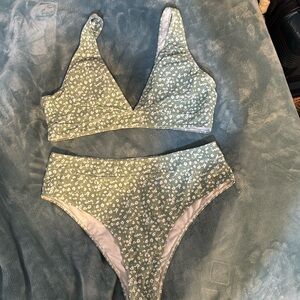 Green floral bikini in XL. Like new. Lightly padded top
